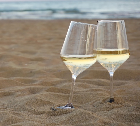 winewhere wine glasses at the sand